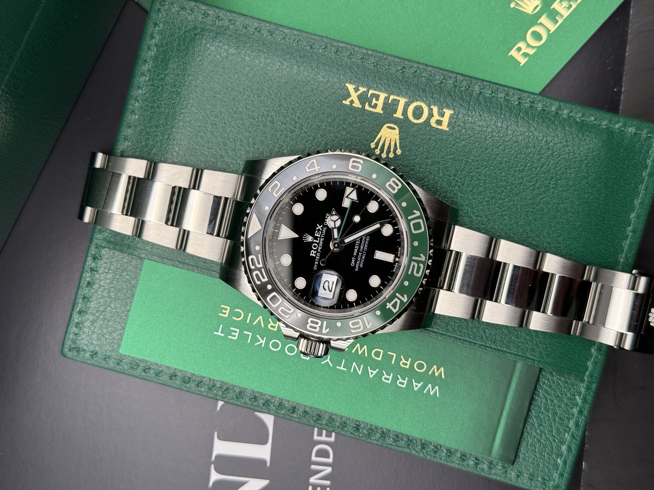 Luxury watch worn at a dealer desk